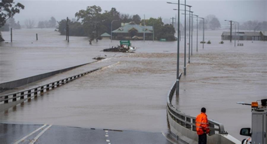 Tropical storm prompts life-threatening flash flooding warning in Australia